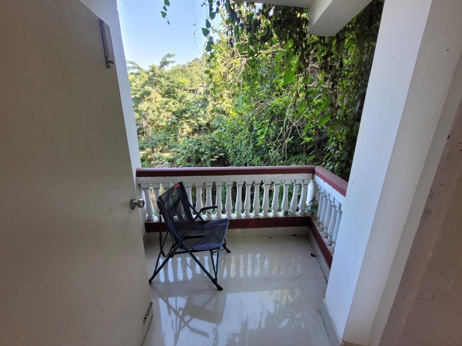 Hilltop Lodge Guwahati Quarto foto